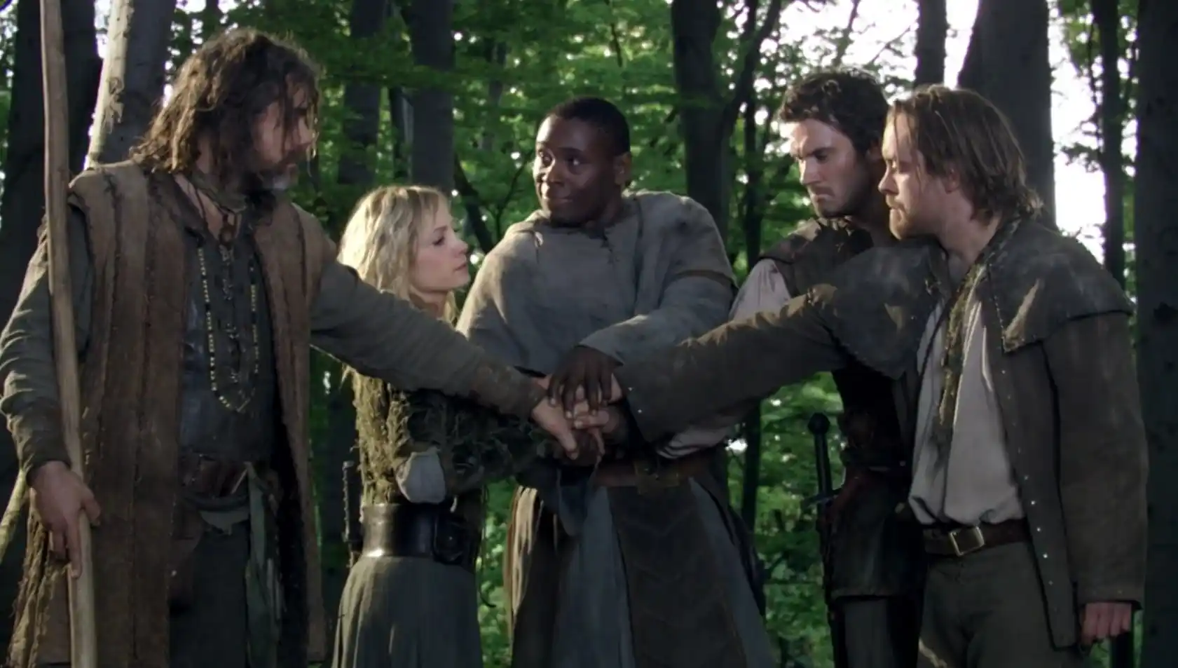 The survivors of the band pledge to carry on in Robin's name