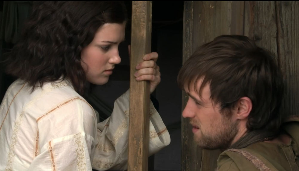 Marian and Robin at a window from episode 7