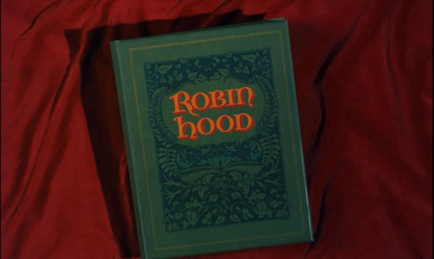 The book opening of Robin Hood cartoon