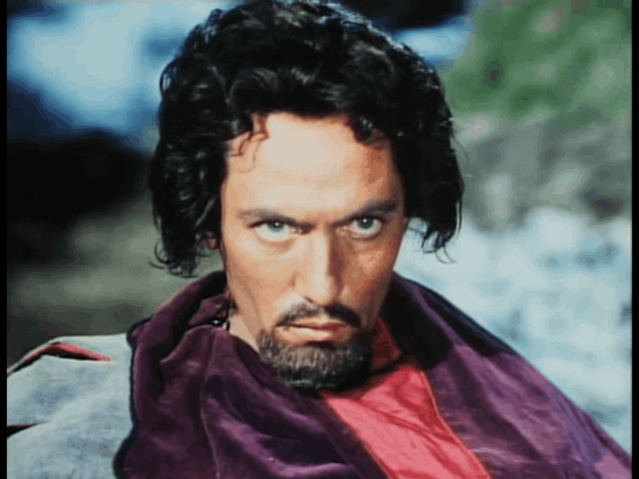 Peter Finch as the Sheriff of Nottingham