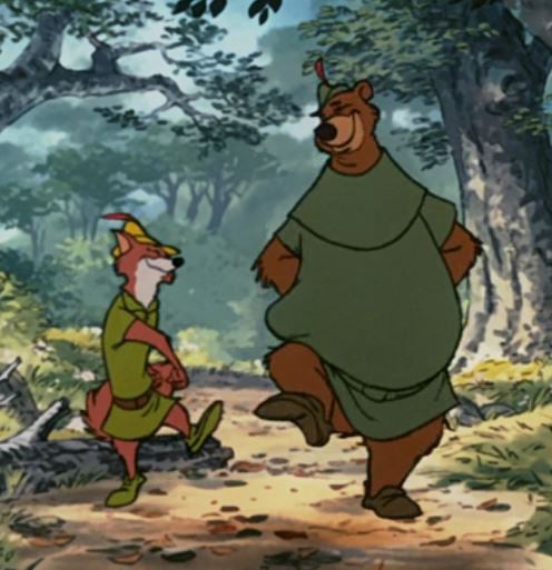 Robin Hood and Little John walking through the forest
