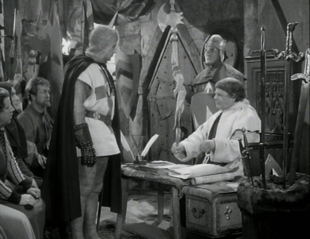 Robin of Locksley speaks to the sheriff's clerk