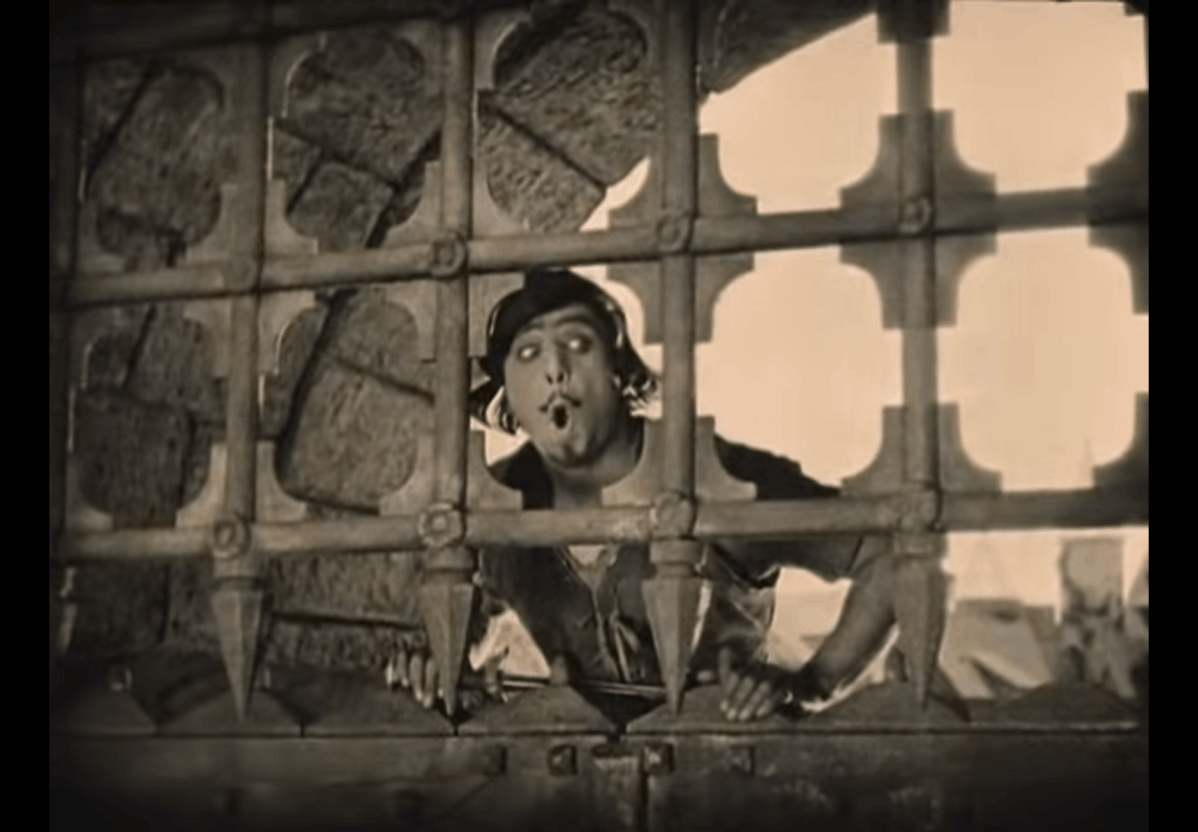 Douglas Fairbanks in Robin Hood keeping a lookout