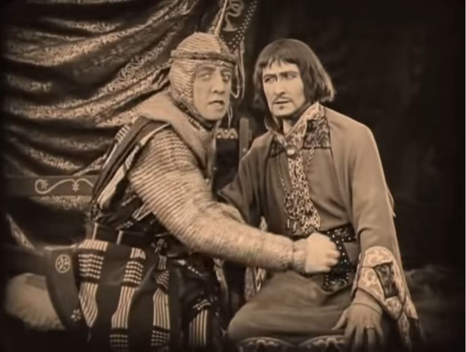 Paul Dickey as Sir Guy of Gisbourne and Sam De Grasse as Prince John