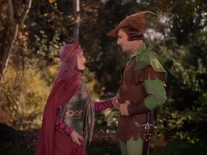 Errol Flynn and Olivia de Havilland discuss why Robin Hood does what he does