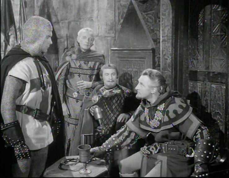 Robin of Locksley and the Sheriff discuss the king's letter