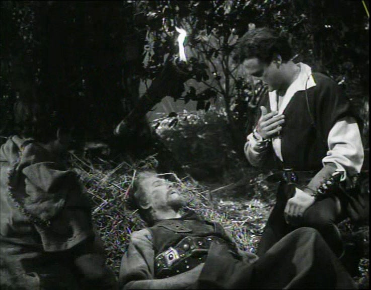 Robin makes the sign of the cross as Will Scathlock dies