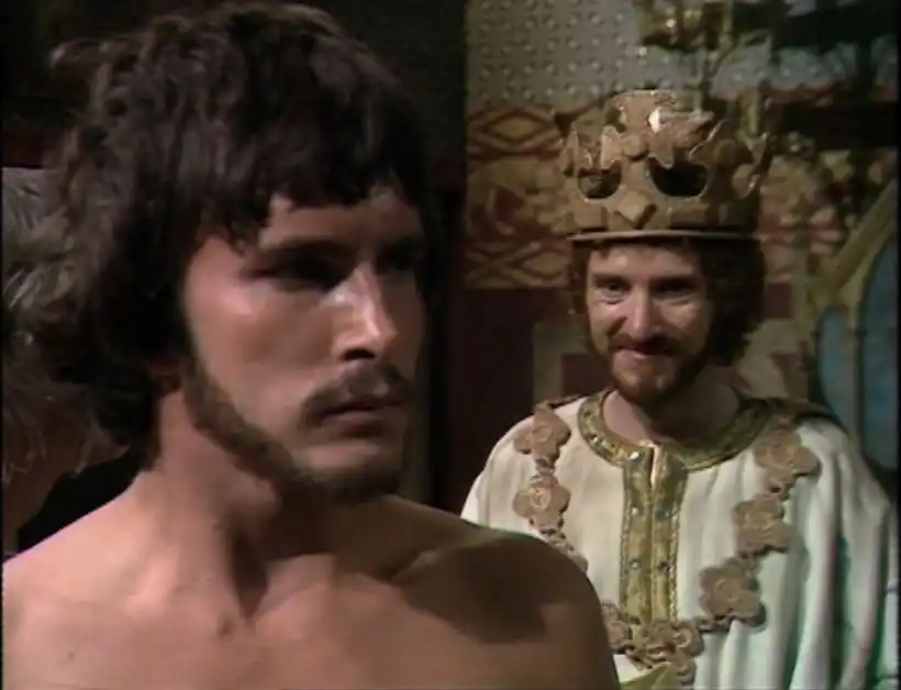 King Richard smiles oddly at Robin Hood