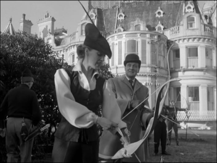Holly Trent proposes a friendly archery contest with John Steed in The Master Minds