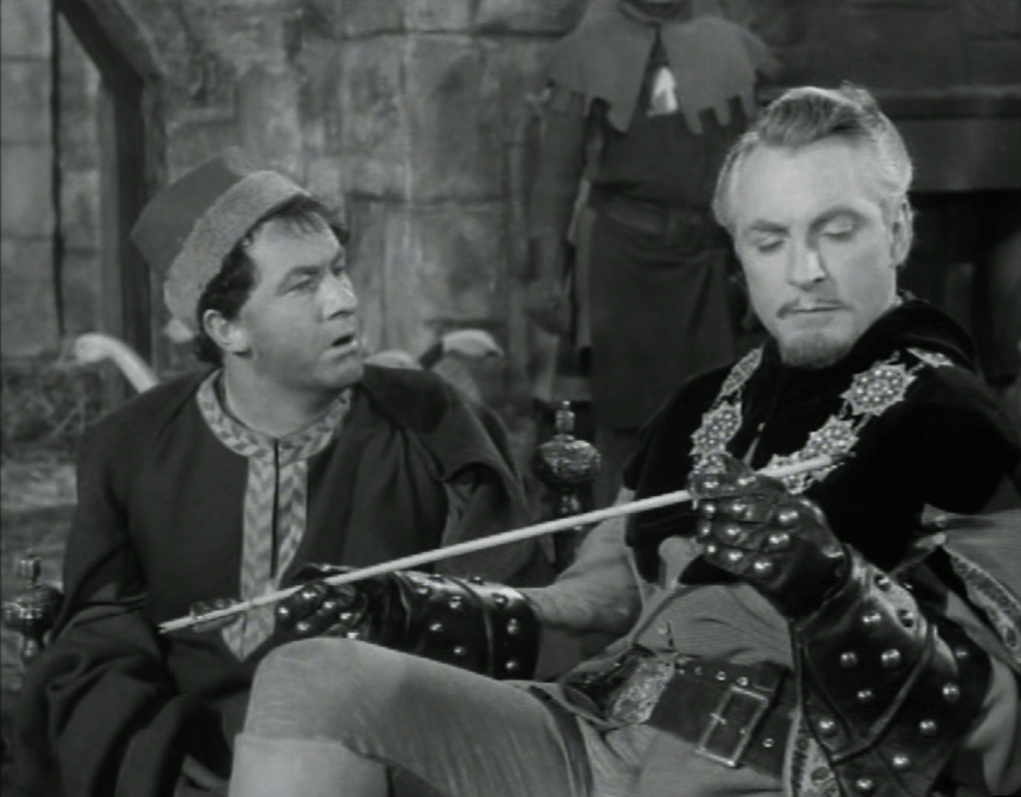 Alan Wheatley's Sheriff of Nottingham examines an arrow