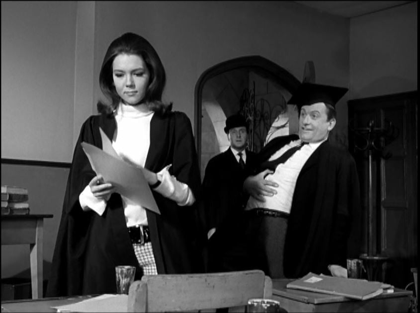 Acheson practices Isometrics - exercise without apparatus -- in front of Steed and Mrs. Peel