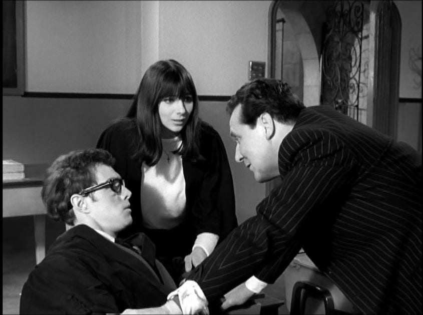 Steed interrogates Pettit and Marianne