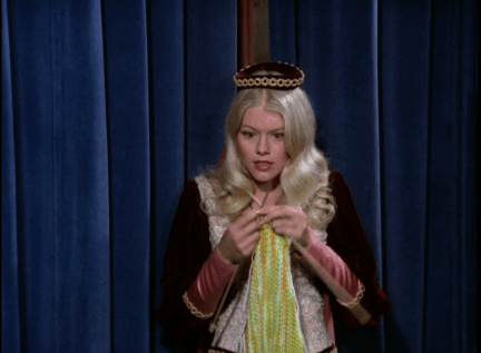 Maid Marian transcribes the Sheriff's plan through knitting